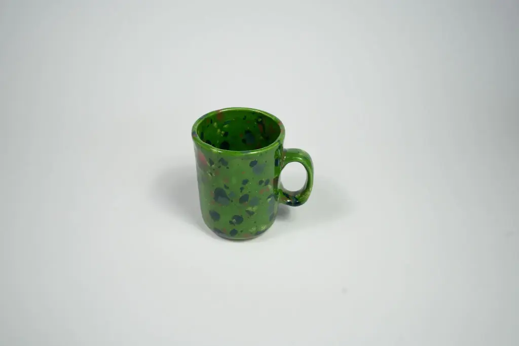 Groene stippen mok met oor
