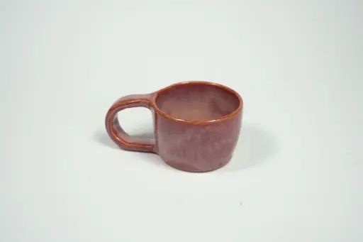 Klein koffiekopje met oor